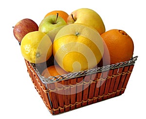 Apple, orange, lemon in basket