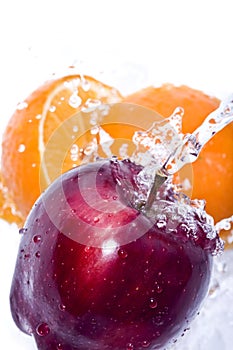 Apple and orange splash
