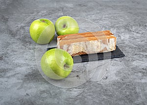 Apple pastille and green ripe apples. Close up.