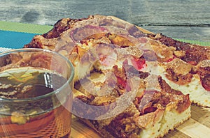 Apple pie with cinnamon and a Cup of tea