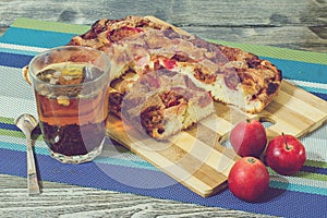 Apple pie with cinnamon and a Cup of tea