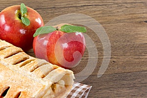 Apple pie decorated with 2 apples