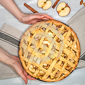Apple pie, hands, apples, cinnamon, sugar, top view