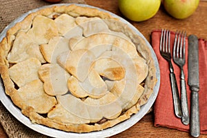 Apple pie with heart shaped crust topping