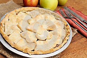 Apple pie with heart shaped crust topping