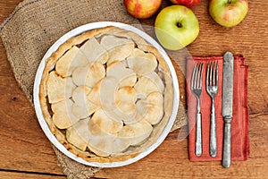 Apple pie with heart shaped crust topping