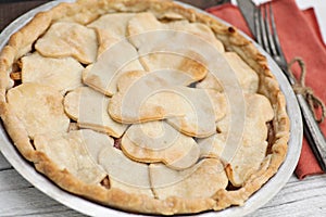 Apple pie with heart shaped crust topping