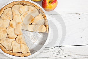 Apple pie with heart shaped crust topping