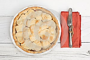 Apple pie with heart shaped crust topping with chalkboard