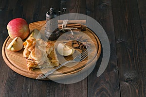 Apple pie ingredients - fresh apples, cinnamon sticks and sugar