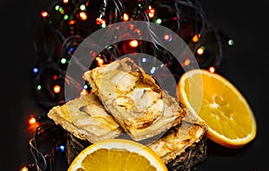 Apple pie with oranges and christmas lights