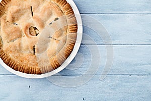 Apple Pie Over Blue Wooden Table Top