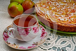 Apple pie with roses and tea