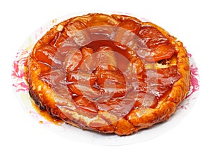 Apple pie tarte Tatin on plate isolated