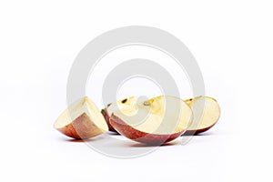 Apple pieces. Cut an apple into four parts. On a white background.