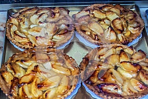 Apple pies in a pastry shop window in Bruges Belgium