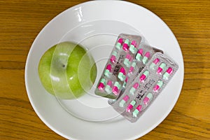 Apple and pills