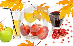 Apple and pomegranate juice isolated on white . Autumn still life with yellow maple leaves. Collage