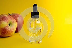 Apple-scented oil. Cosmetic serum with apple extract