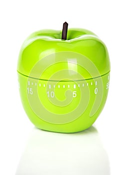 Apple shaped green timer on white