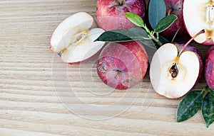 Apple slice on wooden floor