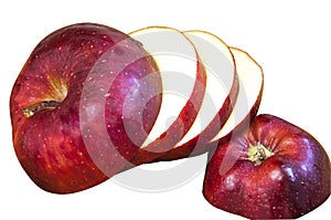 An apple sliced and stacked in a pile