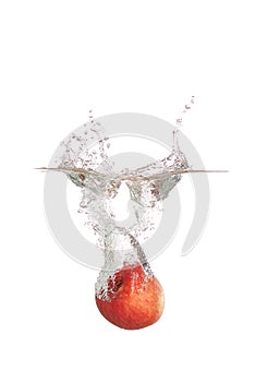 Apple splash into water