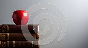 Apple on Stack of Books