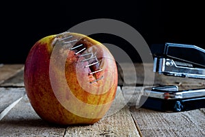Apple with stapler