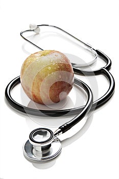 Apple and stethoscope photo