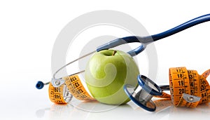 Apple stethoscope and tape measure isolated representing health and nutrition