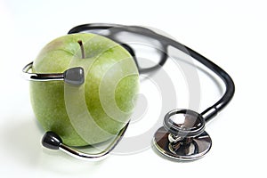 Apple and stetoskop photo