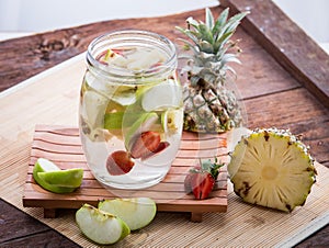 Apple strawberry and pineapple infused water