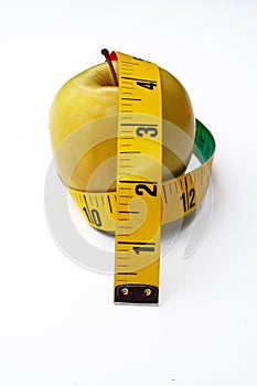 Apple with tape measure