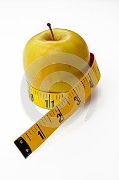 Apple with tape measure