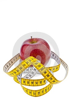 Apple and tape measure for a successful diet