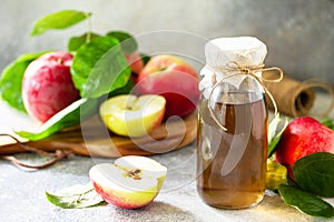 Apple vinegar. Healthy organic food. A bottle of apple cider vinegar.