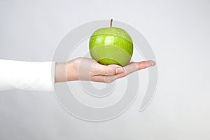 Apple in woman hands