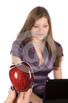 Apple and woman in purple