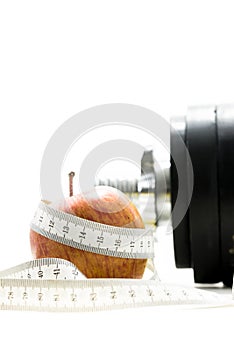 Apple wrapped around with measuring tape