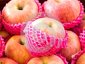 Apple wrapped with foam fruit net,select focus