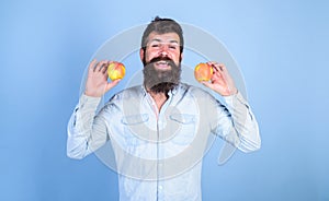 Apples antioxidant compounds responsible health benefits. Nutritional choice. Man with beard hipster hold apple fruit in