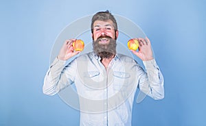 Apples antioxidant compounds responsible health benefits. Nutritional choice. Man with beard hipster hold apple fruit in