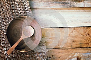 Apples in basket on wooden table