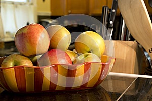 Apples in a bowl on counter