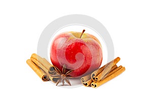 Apples with cinnamon isolated on white background.