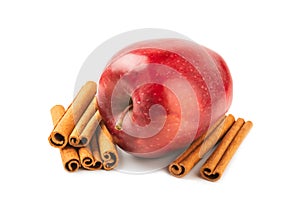 Apples with cinnamon isolated on white background.