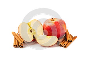 Apples with cinnamon isolated on white background.