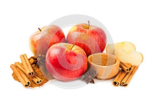 Apples with cinnamon isolated on white background.