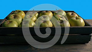 Apples In Crate Moving Shot Bluescreen Isolated